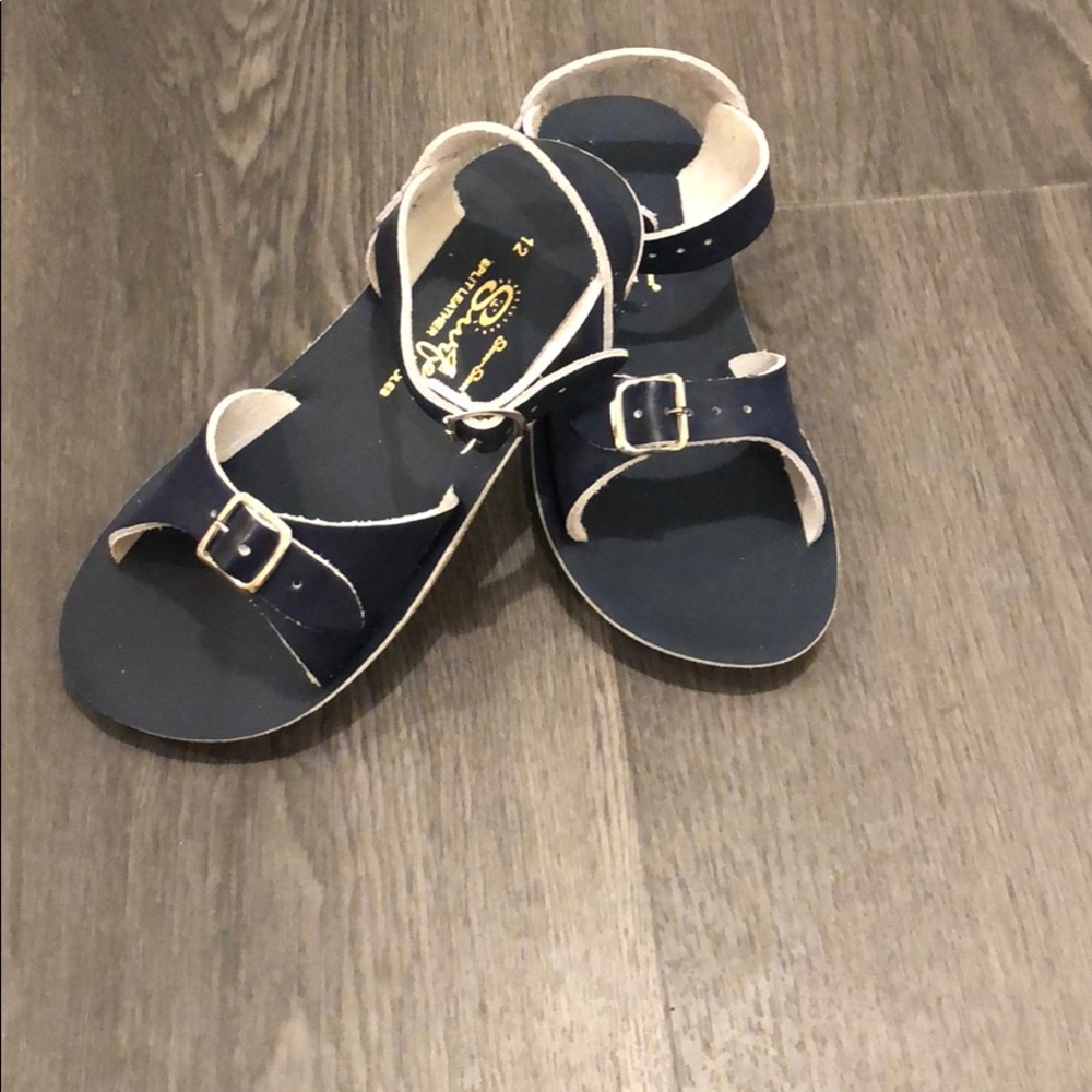 Sun-San surfer sandals.